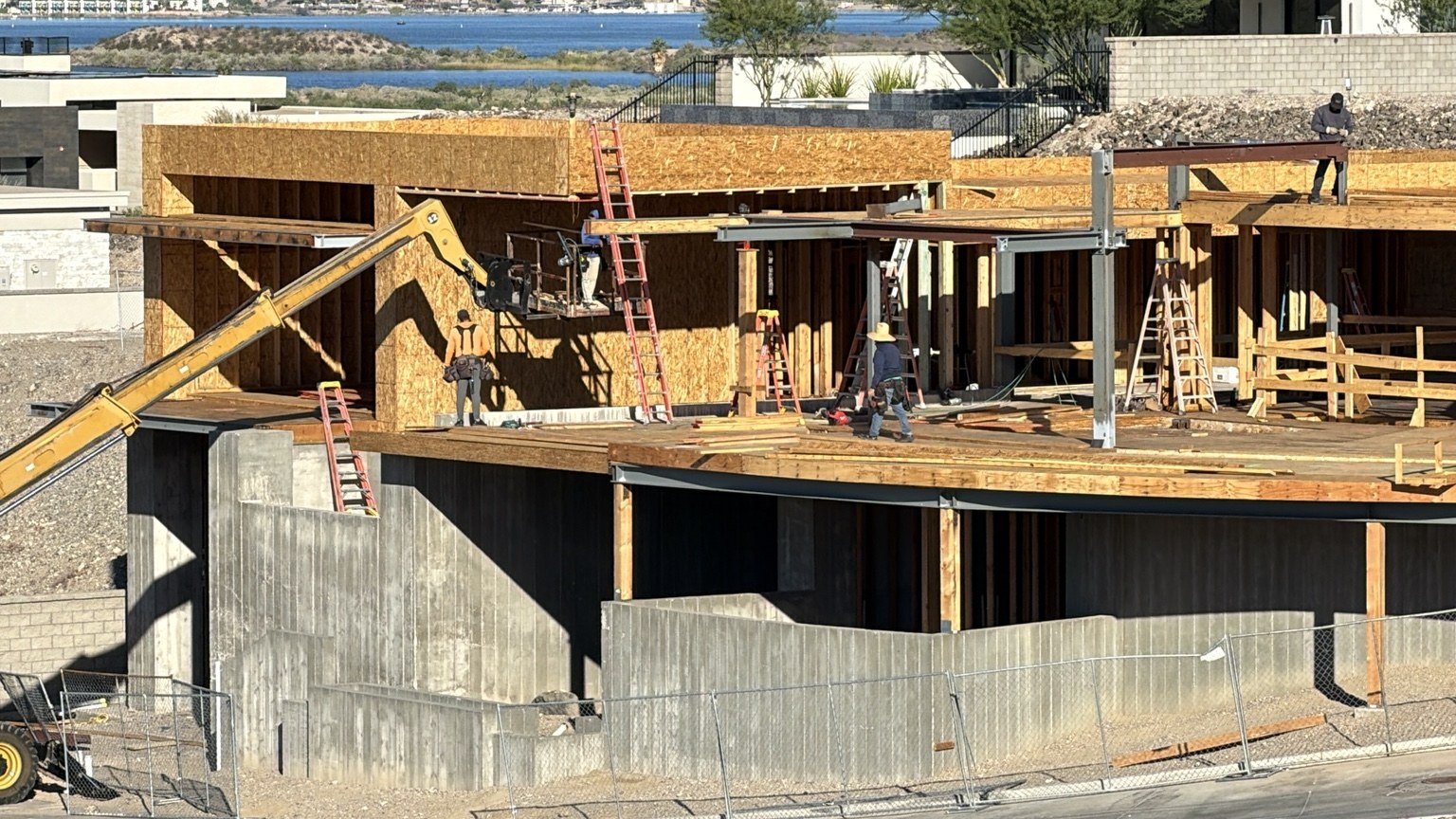 Paragon crew working at wood and steel framing connections